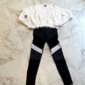 Vimkia black/dark grey leggings with white and black detail.